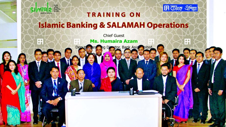 Humaira Azam, Deputy Managing Director of Bank Asia Ltd poses with the participants of a day-long training program on 'Islamic Banking and Salamah Operations' for its 38 officers at its training institute, Tejgaon, Dhaka on Saturday. Head of Training &