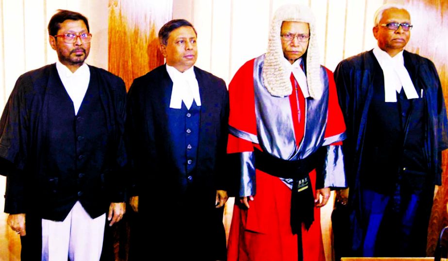 Chief Justice Surendra Kumar Sinha seen with three new judges, Justice Mirza Hossain Haider, Justice Md. Nizamul Huq and Justice Mohammad Bazlur Rahman after the oath taking ceremony held at Supreme Court Judges Lounge on Monday.