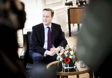 Danish Prime Minister Lars Lokke Rasmussen (unseen) meets with his British counterpart David Cameron at the Prime Minister's Office in Copenhagen, Denmark