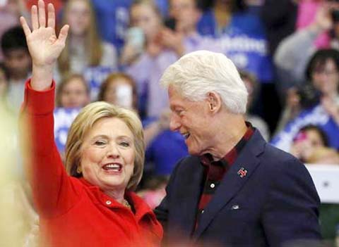 Hillary Clinton and her husband, former President Bill Clinton, had planned to reassess staffing after the first four primaries.