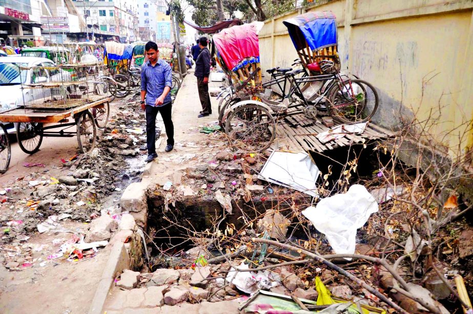 Precarious condition of a footpath in city's Green Road area. This snap was taken on Tuesday.