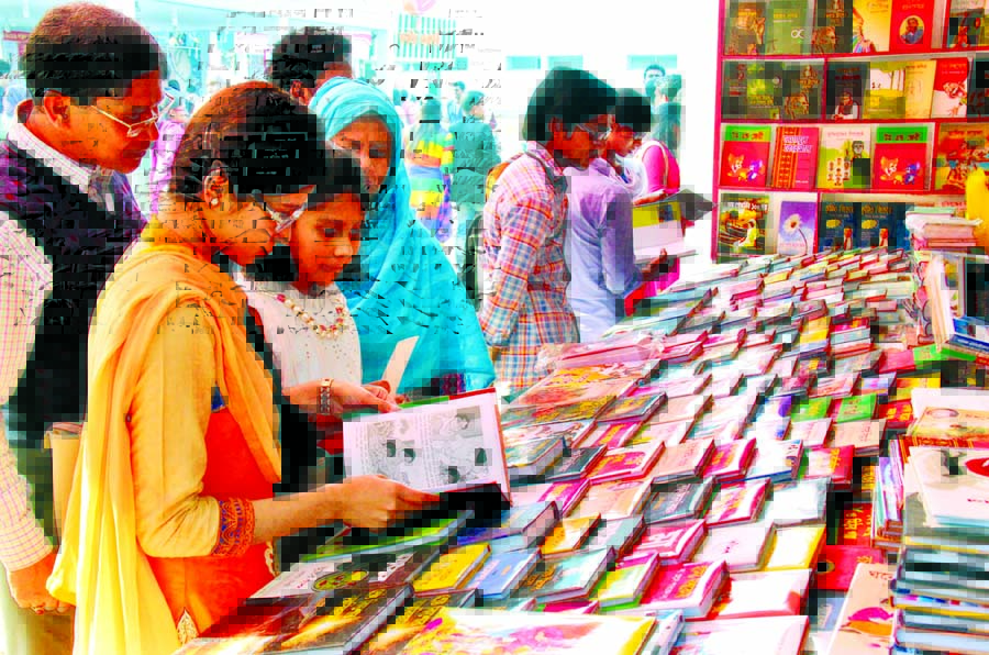 Book-lovers are making their choice at a stall of Ekushey Boi Mela on Tuesday.