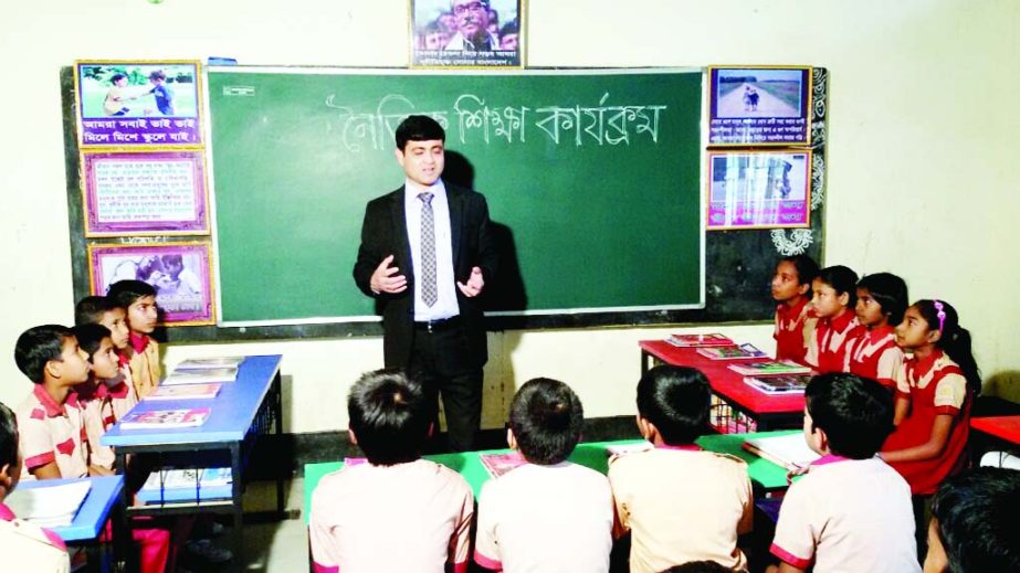 BHANGURA(Pabna): Md Shamsul Alom, UNO, Bhangoora speaking on a moral education activities at Sartia Govt Primary School premises on Tuesday.
