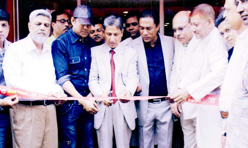 CDA Chairman Abdus Salam formally inaugurating the Well Food Branch at Nozu Miah Heat at Niamot Ali Road in Chittagong cutting ribbon yesterday.