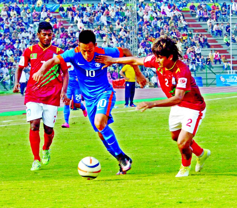 A scene from the first semi-final match of the Men's Football Competition of the South Asian Games between Bangladesh Football team and India Football team at the Indira Gandhi Stadium in Guwahati on Saturday.