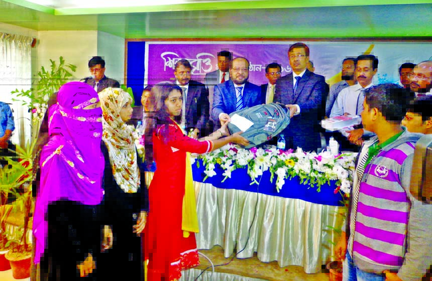 Abdul Mannan, Managing Director of Islami Bank Bangladesh Limited handing over certificates and scholarship money to under privileged meritorious students of Khulna region on Sunday.