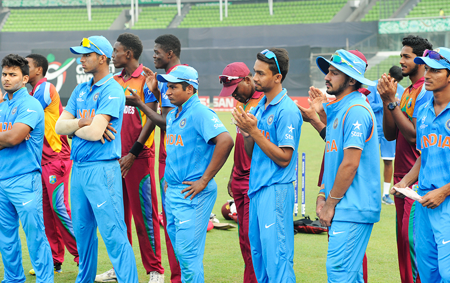 A dejected Indian side watches the post-match presentation after Under-19 World Cup 2016, final match against West Indies at the Sher-e-Bangla National Cricket Stadium in Mirpur on Sunday.