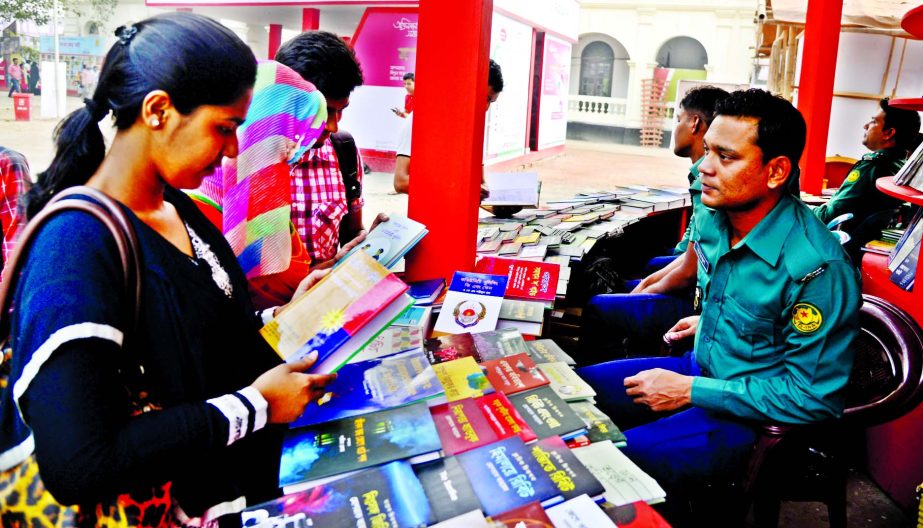 Book-lovers are making their choice at a book stall of Bangladesh Police at Ekushey Boi Mela on Tuesday.