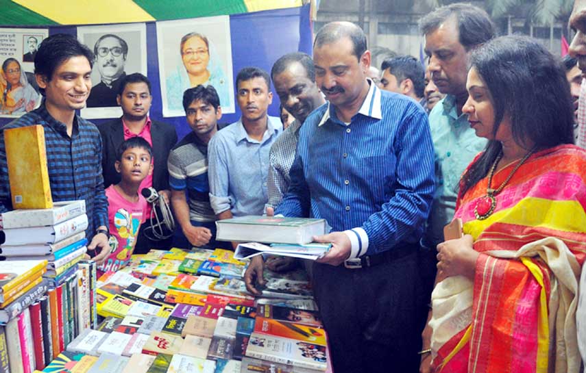 CCC Mayor AJM Nasir Uddin visiting a stall at Book Fair at Nandankanan Muslim Institute in the city organised by CCC on Wednesday.