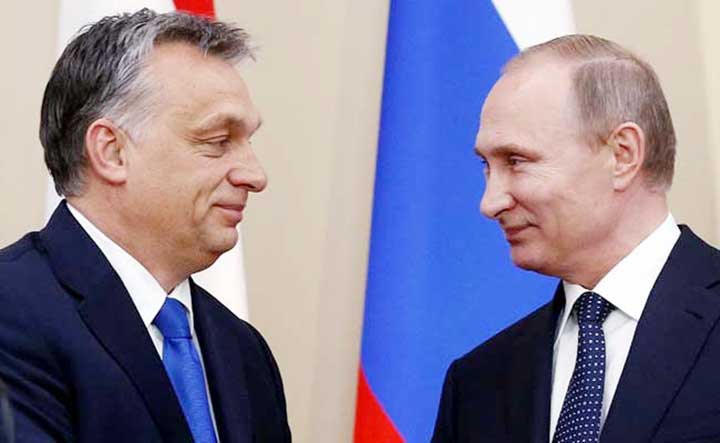 Vladimir Putin (R) and Hungarian Premier Viktor Orban attend a joint press conference at the Novo-Ogaryovo state.