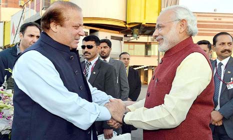 Indian Prime Minister Narendra Modi (R) shaking hands with Pakistan Prime Minister Nawaz Sharif in Lahore.