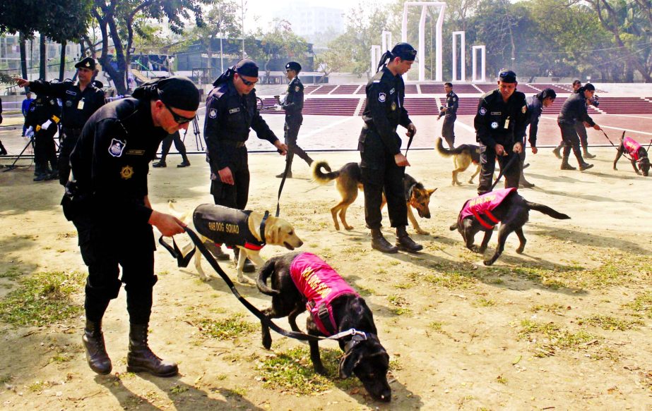 Law enforcers searching around the Central Shaheed Minar premises in the city on Friday with dog squad to beef up security ahead of Amar Ekushey and International Mother Language Day.