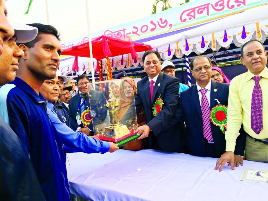 Secretary of the Ministry of Railway Mohammed Firoz Salauddin distributing the prizes to the winner of the Annual Sports Competition of Chittagong Railway at the Polo Ground in Chittagong on Friday.