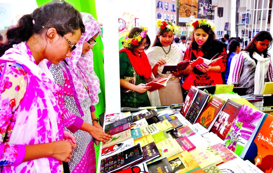 Book-lovers alongwith children crowding the Amar Ekushey Boi Mela to have their choice at the weekend on Friday.