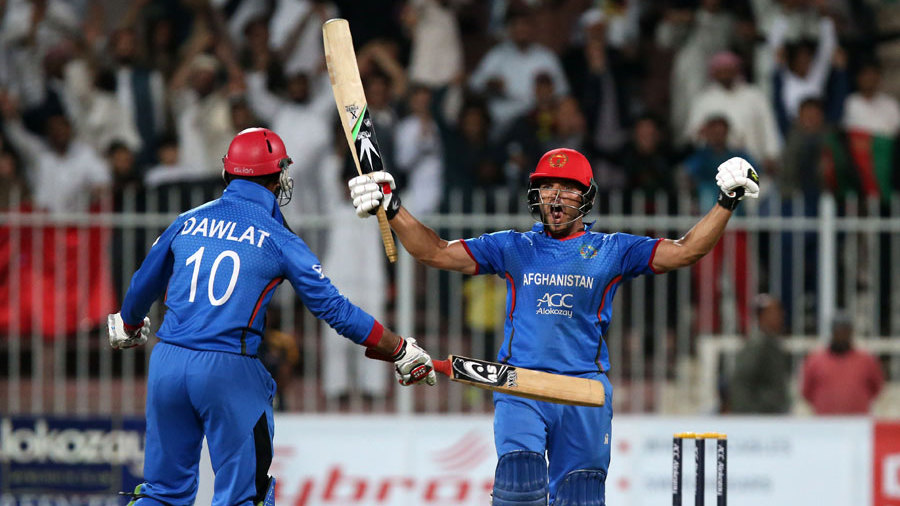 Dawlat Zadran's (left) twin sixes in the last over helped Afghanistan to seal their first win against Oman in the qualifying round match of Asia Cup T20 at the Khan Shaheb Osman Ali Stadium in Fatullah on Saturday.