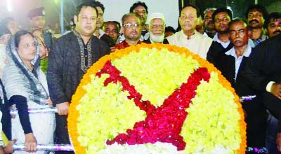 RANGPUR: Former President and Jatiyo Party Chairman and Prime Minister's Special Envoy to the Prime Minster H M Ershad placing wreaths at central Shaheed Minar to observed the Amar Ekushey and International Mother Language Day in Rangpur on Sunday.