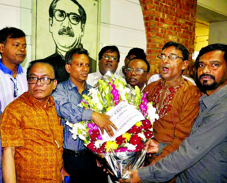 Faridpur Journalists Foundation greeted newly elected President of Dhaka Union of Journalists Shaban Mahmood in front of Bangabandhu's portrait at Jatiya Press Club in the city on Monday.