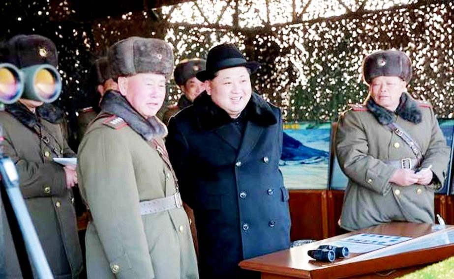 North Korean leader Kim Jong-Un inspecting maneouvers for attack and defence between large combined units of the Korean People's Army.