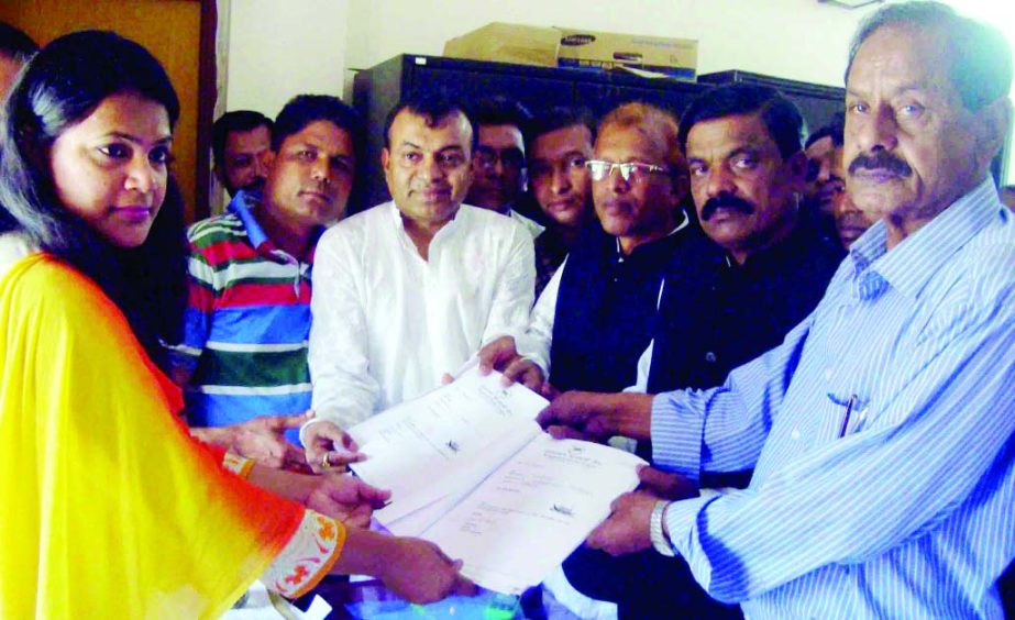 BARISAL: Abdul Jalil Ghorami, Chairman candidate in Banaripara UP submitting nomination paper to Returning officer Shahidul Islam on Monday.