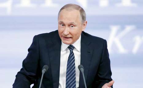 Russian President Vladimir Putin talking to newsmen in Moscow.