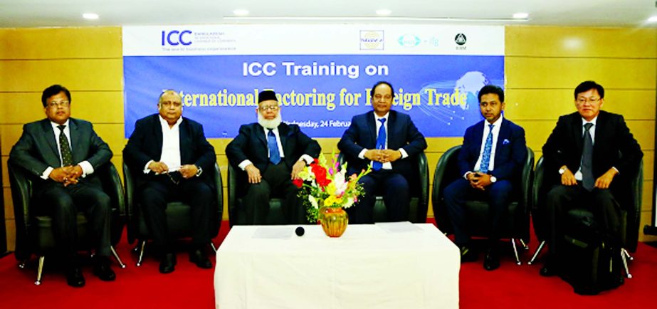 ICC Bangladesh President Mahbubur Rahman (3rd from left) poses at the inaugural session of the ICC Training on International Factoring for Foreign Trade in the city on Wednesday. Hedayet Ullah Al-Mamoon (3rd from right), Senior Secretary, Ministry of Comm