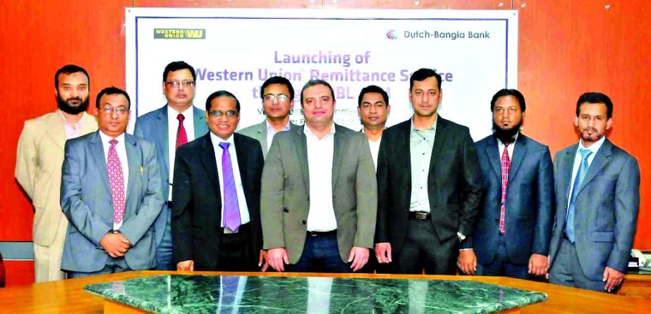 Faisal Alhijawi, Senior Business Development Manager, Western Union-Middle East and Africa and Naved Ashraf, Senior Country Manager, Western Union-Bangladesh and Abul Kashem Md. Shirin, Deputy Managing Director of Dutch Bangla Bank pose at an agreement si