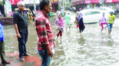 NARAYANGANJ: Roads at Nawab Salimullah area went under water due to sudden nor'wester on Wednesday.