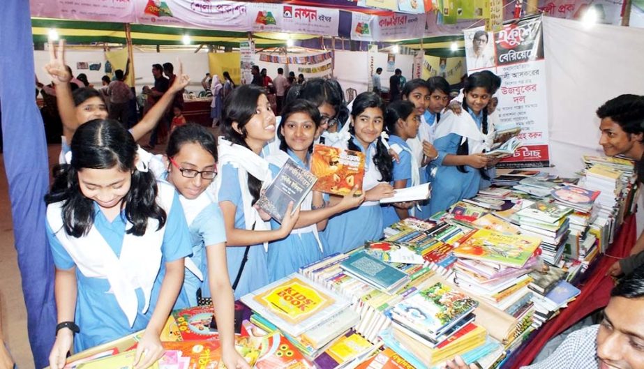 Students of different educational institutes gathered at Book Fair at Muslim Hall premises in Chittagong on Tuesday.