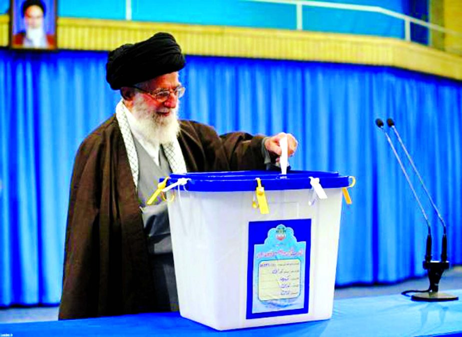 Iran's Supreme Leader Ayatollah Ali Khamenei casts his vote during elections for the parliament and Assembly of Experts, which has the power to appoint and dismiss the supreme leader in Tehran on Friday.