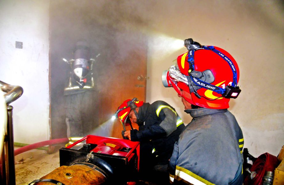 Fire Service workers extinguishing fire which suddenly broke out at the ICB Capital Management at city's Kakrail area on Friday. No casualty was reported.