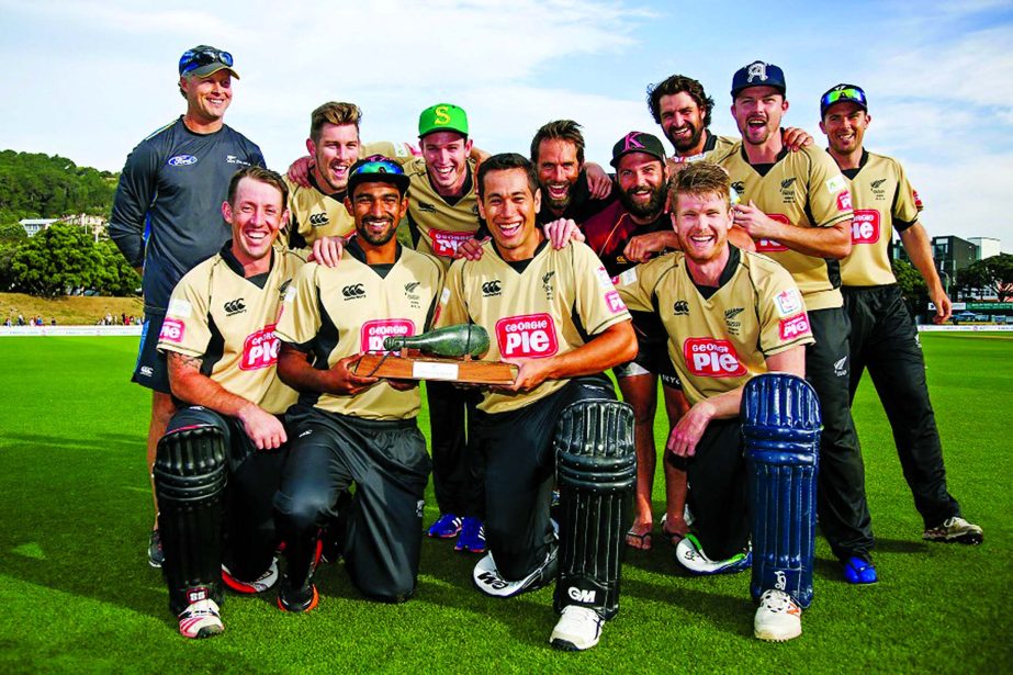 The North Island team poses with the series trophy beating South Island in Island of Origin T20 match at Wellington on Sunday.