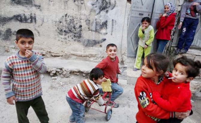 Children play in the rebel-held Tishreen district of Damascus.