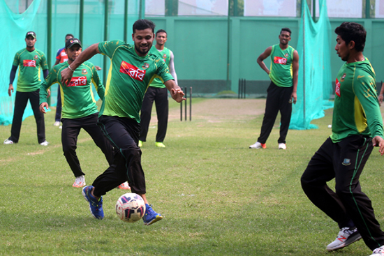 Mashrafe Bin Mortaza and his teammates playing football as part of their practice session at the BCB-NCA Ground in Mirpur on Tuesday. Bangladesh will take on Pakistan today.