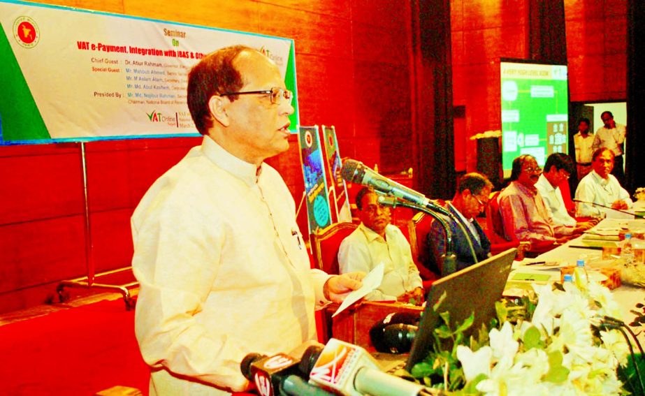 Bangladesh Bank Governor Dr. Atiur Rahman speaking at a seminar on 'VAT e-Payment, Integration with IBAS and other Commercial Banks' at Institute of Diploma Engineers in the city on Wednesday.