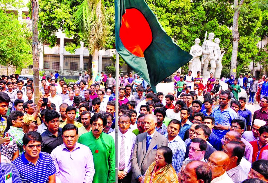 DU VC AAMS Arefin Siddique along with teachers and students attended the premises of Aparajeo Bangla on Wednesday marking the Flag Hoisting Day of Bangladesh.