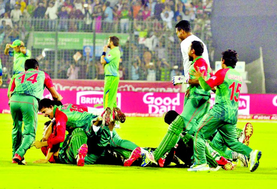 Players of Bangladesh Cricket team celebrate after beating Pakistan in their Asia Cup Cricket match at the Mirpur Sher-e-Bangla National Cricket Stadium on Wednesday. Photo Moin Ahmed