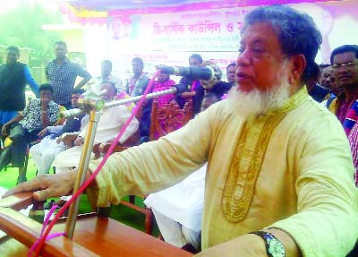 SAGHATA(Gaibandha): Deputy Speaker of the National Parliament Adv Fazley Rabbi Mia MP speaking at the triennial council of Fulchhari Upazila Awami League as Chief Guest on Wednesday.