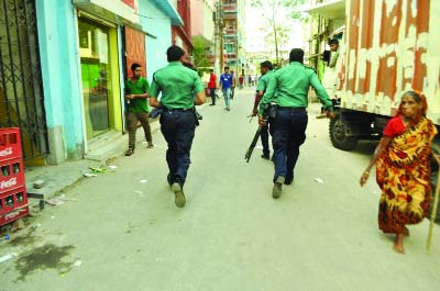 BARISAL: Police patrolling during a clash between cops and students of Barisal University around the campus on Wednesday.