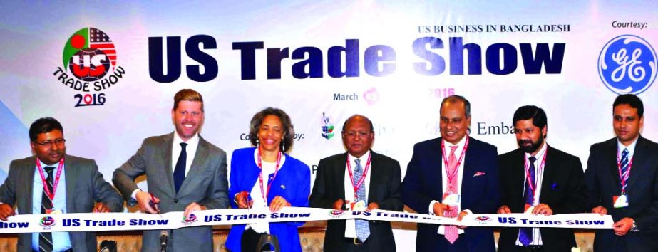 Commerce Minister Tofail Ahmed inaugurating the 24th annual US Trade Show at Sonargaon Hotel in the city on Thursday. US Ambassador to Bangladesh Marcia Bernicat, Asia Pacific Council of American Chambers of Commerce Chairman Jackson Cox and AmCham Bangla