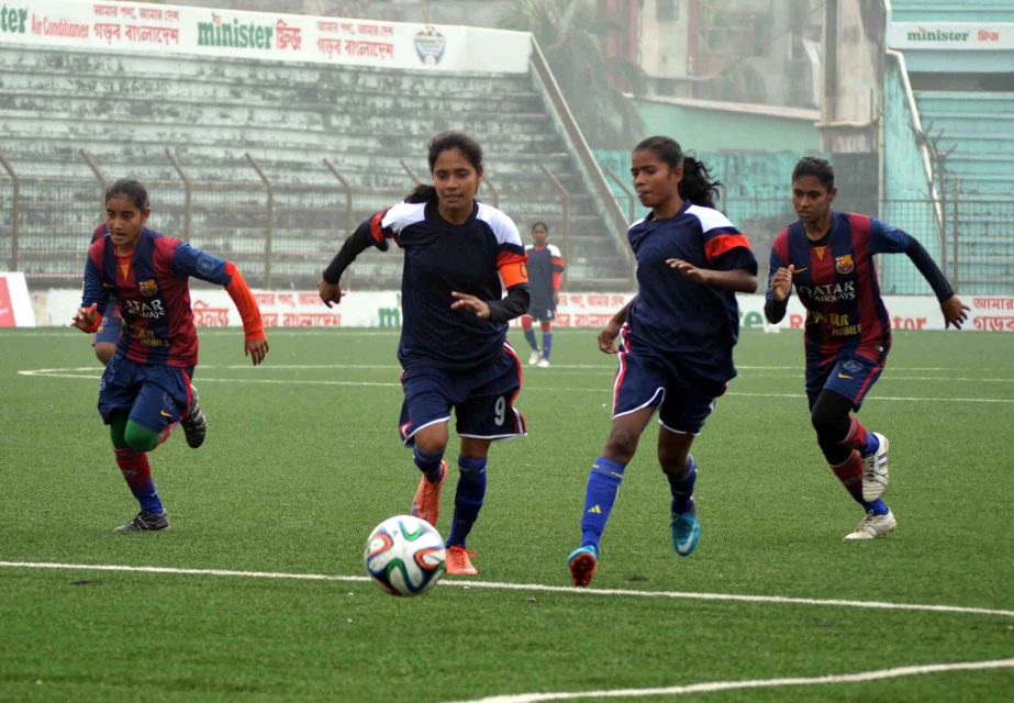 A scene from the match of the final round of the KFC National Women's Football Championship between Tangail District team and Satkhira District team at the Bir Shreshtha Shaheed Sepoy Mohammad Mostafa Kamal Stadium in Kamalapur on Thursday.