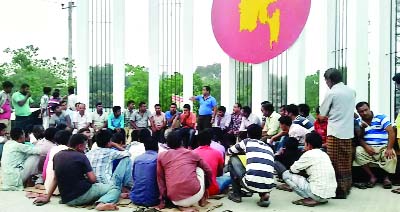 SIRAJGANJ: Ignoring the dignity of Shaheed Minar, a group of CNG run auto rickshaw drivers with their shoes arranged a meeting on the main altar of Sirajganj Shaheed Minar. This picture was taken yesterday.