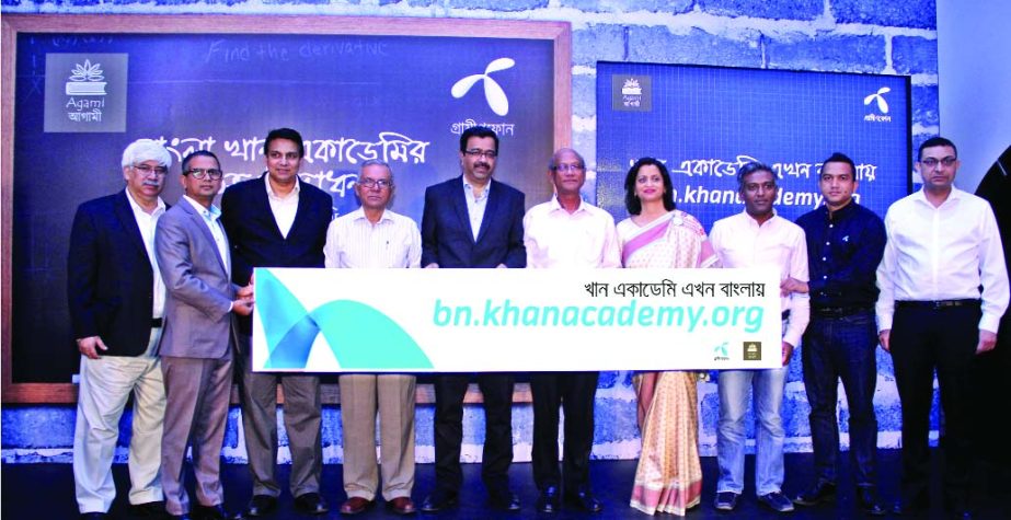 Education Minister Nurul Islam Nahid,CEO of Grameenphone Rajeev Se and President of Agami Education Foundation Prof. Mosihuzzaman pose at the inaugural ceremony of Khan Academy Bangla website in the city on Tuesday