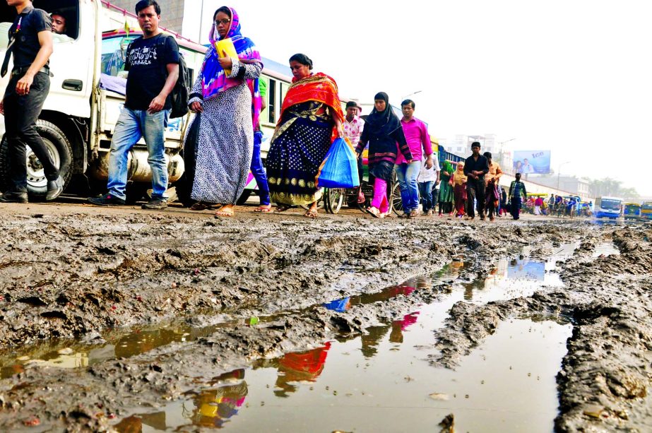 The main thoroughfare near the Jatrabari Thana is in a dilapidated condition as a large portion of it are full of muddy and filthy sewage -water due to poor drainage management causing sufferings to commuters as well as halted the vehicular movement for a