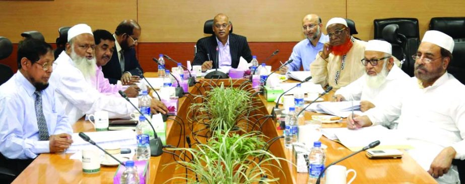 Abdus Samad, Chairman of the Executive Committee of the Board of Directors of Al-Arafah Islami Bank Limited, presiding over the 525th meeting at at the Bank's board room on Saturday. Managing Director of the bank Md Habibur Rahman, among others, were pre