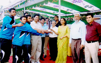 Vice-Chancellor of BUET Professor Khaleda Ekram handing over the trophy to the winners team of the Inter-University Athletics Competition at the BUET playground recently.