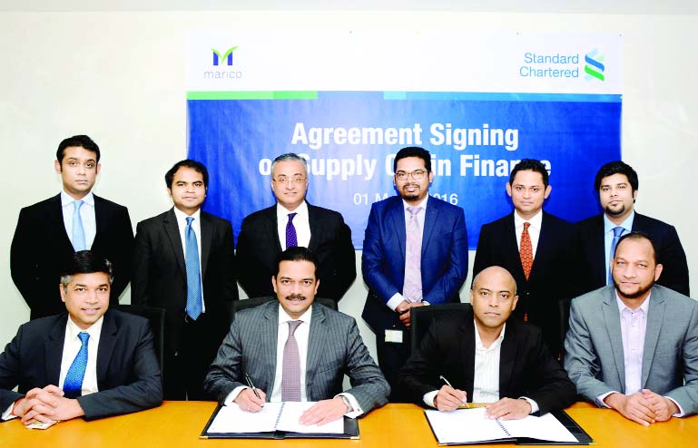 Abrar A Anwar, CEO of Standard Chartered Bangladesh and Aditya Shome, Managing Director of Marico Bangladesh Ltd sign an agreement of supply chain finance program in the city recently. Under this agreement dealers of Marico will get financing facility fro