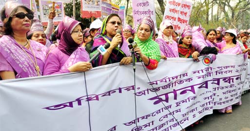 Marking the World Women's Day, Directorate of Women Affairs formed a human chain in front of the Jatiya Press Club on Sunday.