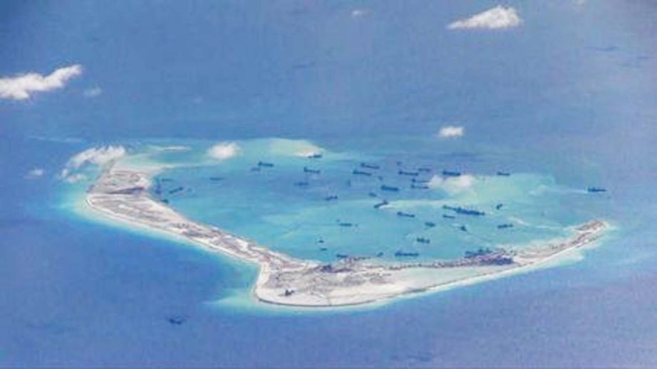 Chinese dredging vessels are purportedly seen in the waters around Mischief Reef in the disputed Spratly Islands in the South China Sea.