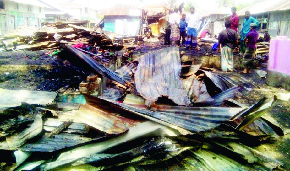 BETAGI (Barguna): About 12 business houses were gutted by a devastating fire at Chandakhali Bazar in Betagi on Tuesday night.