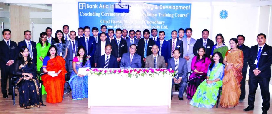 A. Rouf Chowdhury, Chairman of Bank Asia, poses with the participants of 37th Foundation Training Course after handing over certificates at the concluding ceremony held at Bank Asia Institute for Training & Development, Rangs Bhaban, Tejgaon, Dhaka on Wed